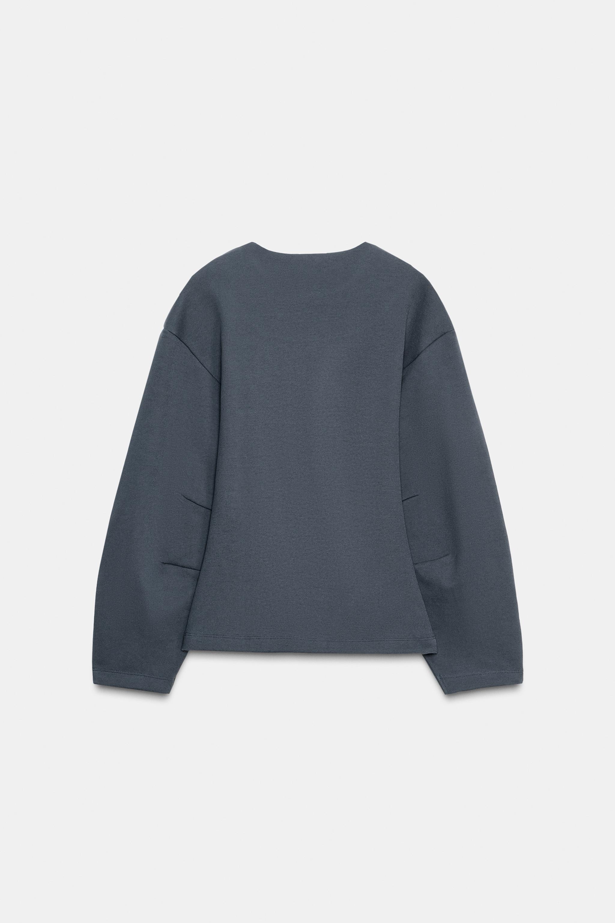 INTERLOCK JUMPER WITH DARTS